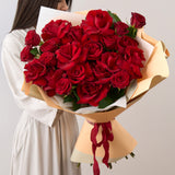 Tarana Burke: Bouquet of 12 Red Roses