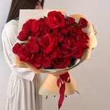 Tarana Burke: Bouquet of 12 Red Roses